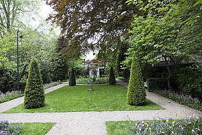 Herengracht 502 Tuin met prieeltje aan het einde van H. Walenkamp uit 1907